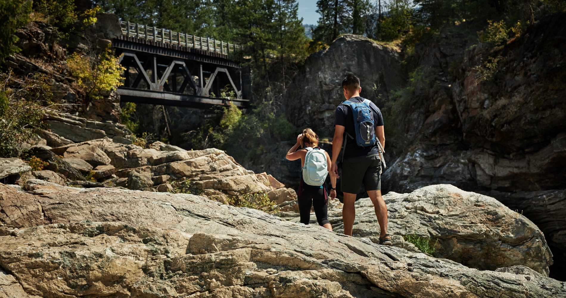 A couple hiking at Cascade Falls near Christina Lake | Hubert Kang